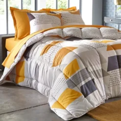 BecquetCouette chaude 400 g/m² jaune réversible à motifs géométriques - GEO