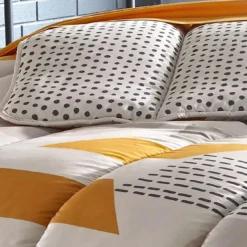 BecquetCouette chaude 400 g/m² jaune réversible à motifs géométriques - GEO