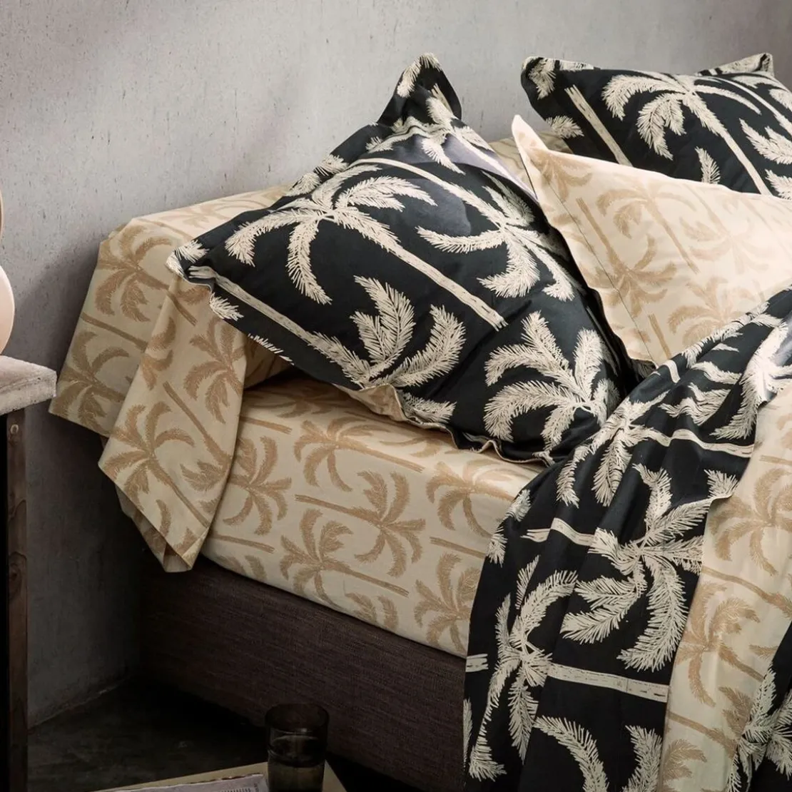 BecquetDrap plat coton noir charbon à motif tropical beige - TOURISME