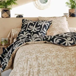 BecquetDrap plat coton noir charbon à motif tropical beige - TOURISME