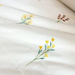 BecquetDrap plat percale de coton FLEURETTES - blanc cassé