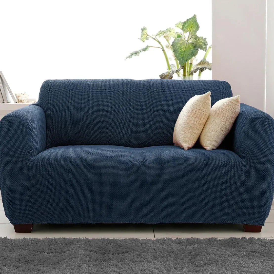 BecquetHousse de canapé bi-extensible bleue unie - CORA BI