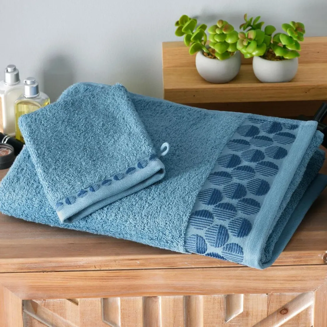 BecquetLot de 2 gants de toilette en coton bleu avec liteau cercle - EP. SERVOPTIQUE