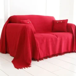 BecquetPlaid ou jeté de canapé uni en coton ORION - Rouge