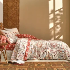 BecquetTaie de traversin en coton DISQUES SOLAIRES style folk - terracotta