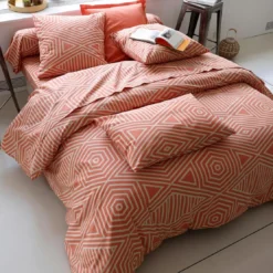 BecquetTaie de traversin graphique bicolore DR.THEO orange poterie