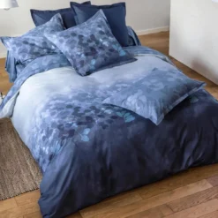 BecquetTaie de traversin à motifs imprimés en coton DR.CHARMILLE Bleue