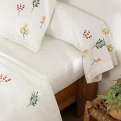 BecquetTaie de traversin percale de coton FLEURETTES - banc cassé