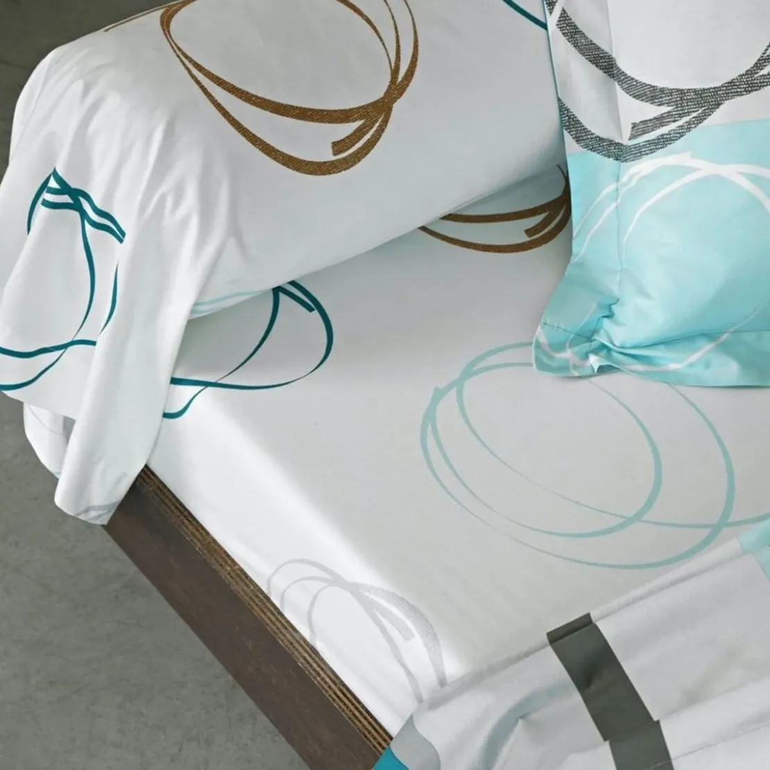 BecquetTaie d'oreiller ou traversin motif spirales - vert d'eau