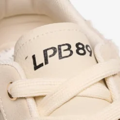 Les Petites BombesBaskets beiges et dorées