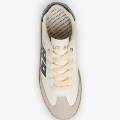 Les Petites BombesBaskets blanches avec détails verts métallisés blanc perle