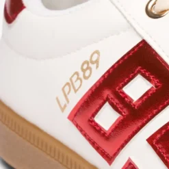 Les Petites BombesBaskets blanches avec détails rouges métallisés blanc écru
