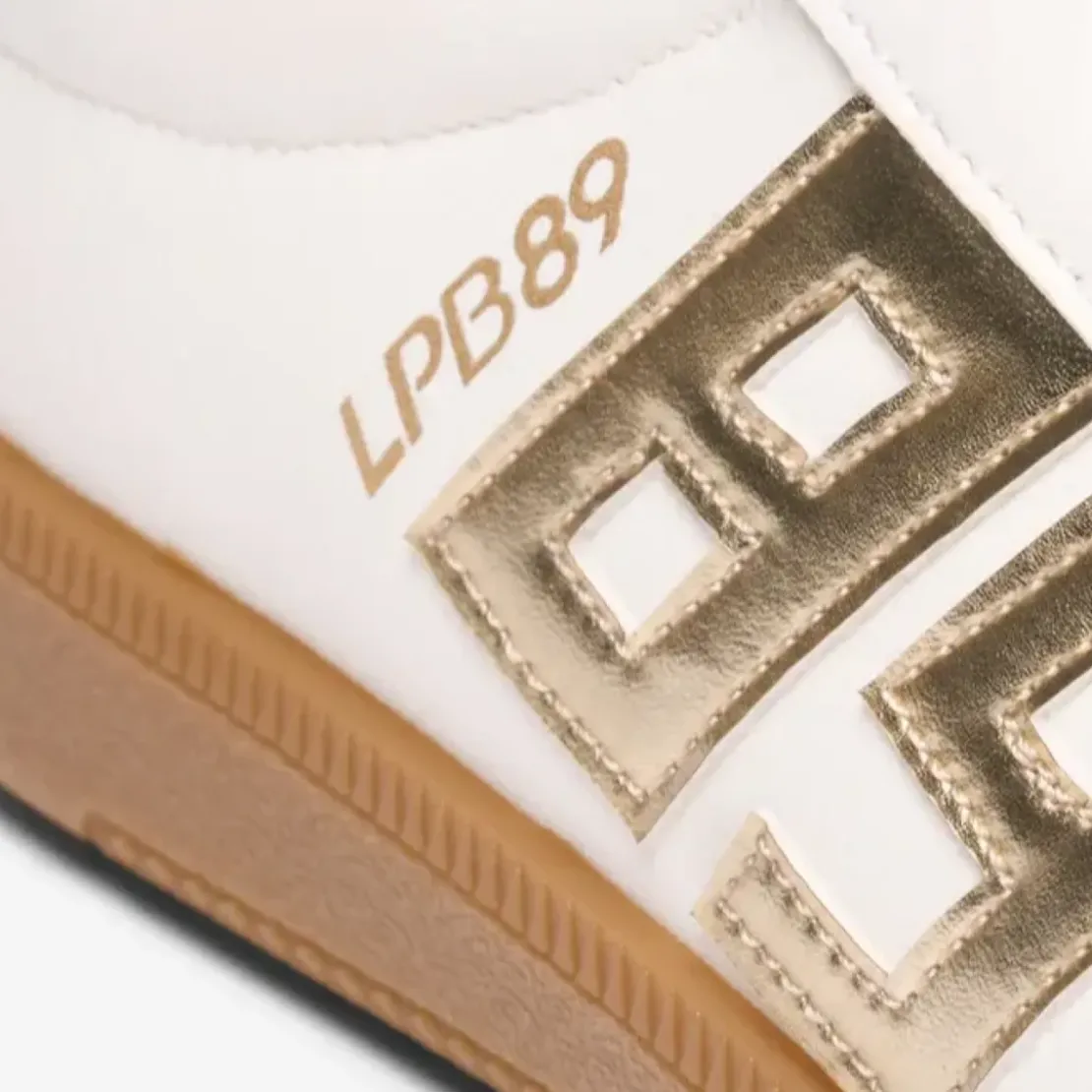 Les Petites BombesBaskets blanches et dorées blanc cassé