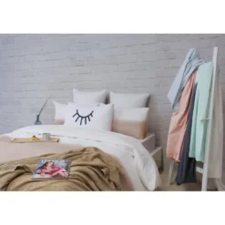 L'Officiel Interiors Plaid en coton beige - Les basiques