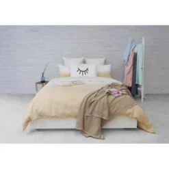 L'Officiel Interiors Plaid en coton beige - Les basiques