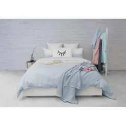 L'Officiel InteriorsPlaid en coton bleu ciel - Les basiques