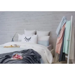 L'Officiel InteriorsPlaid en coton gris foncé - Les basiques